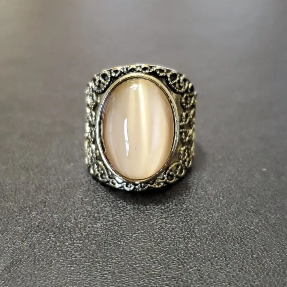 Gold tone ring with stone